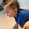 toddler, child, indoor, crawling, blue_shirt, hand, floor, hair, side_profile, kitchen, cabinet, person, curious, young_child, skin, head, support, home, light, casual