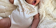 Anelé joined the competition — help win amazing prizes! baby, blanket, child, cozy, cute, expression, face, floral, hand, hat, indoors, infant, lying_down, onesie, portrait, skin, sleepwear, sock, soft, white_clothing