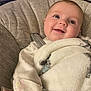 Delilah May joined the competition — help win amazing prizes! baby, blanket, car, car_interior, carseat, crib, cushion, face, furniture, happy, head, homedecor, infantbed, newborn, person, photography, portrait, smile, transportation, vehicle