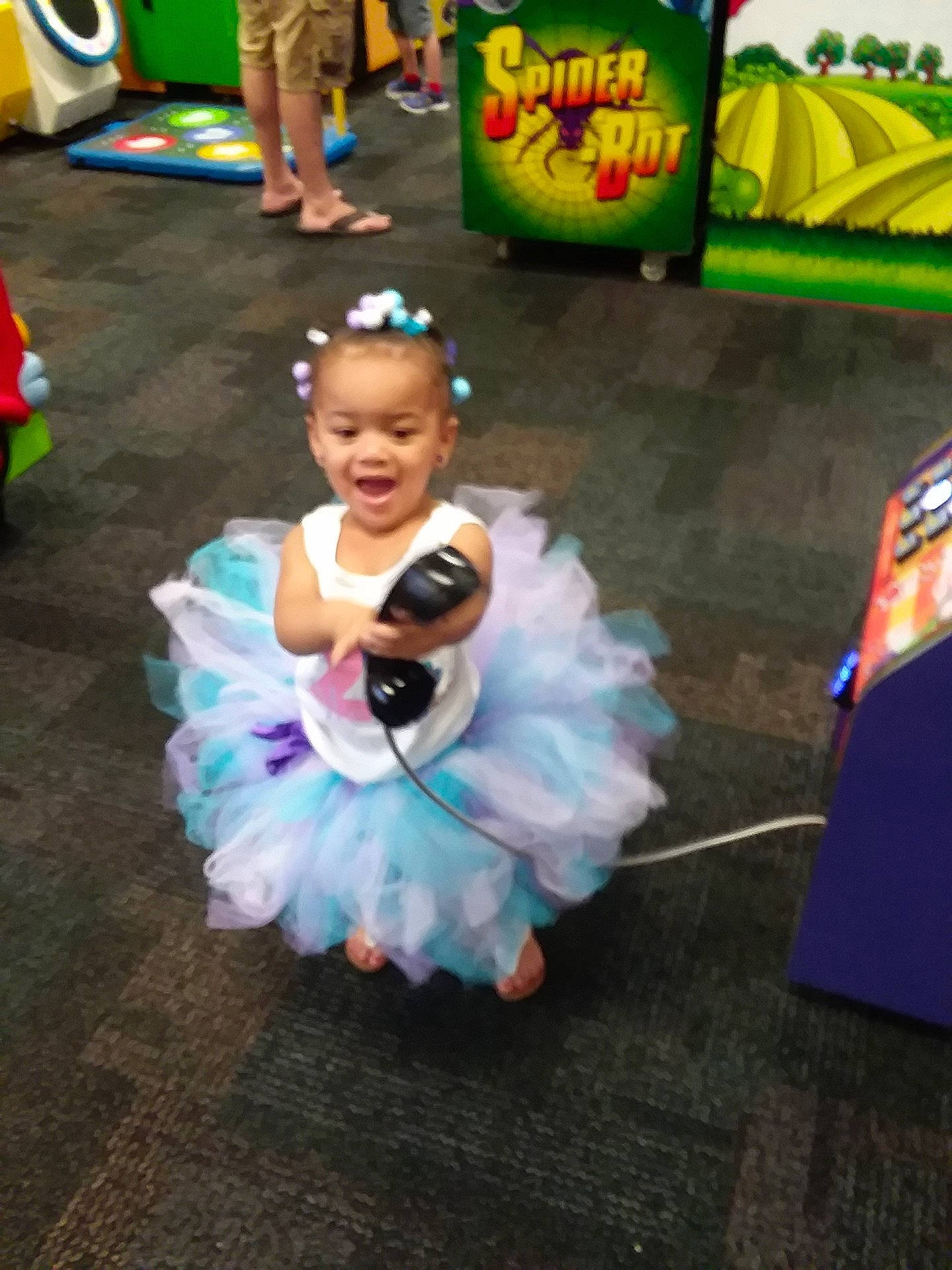 Ame is registered to the contest to win money with this photo: ballet_tutu, child, costume, day, fun, performance, person, play, product, recreation, toddler