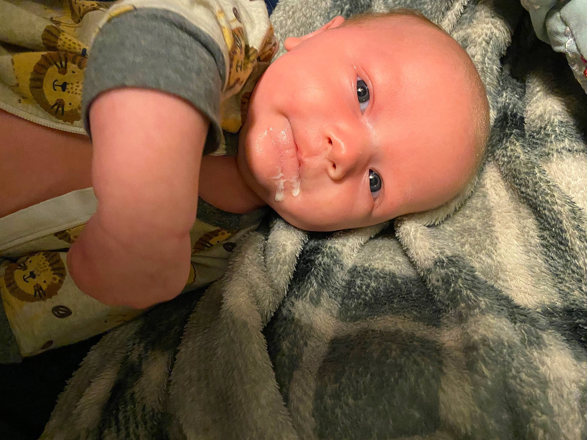 Izaiah is registered to the contest to win money with this photo: arm, baby, camouflage, cap, child, eye, grass, hat, headgear, human_body, marines, military_camouflage, military_person, nose, pattern, person, sitting, skin, smile, toddler