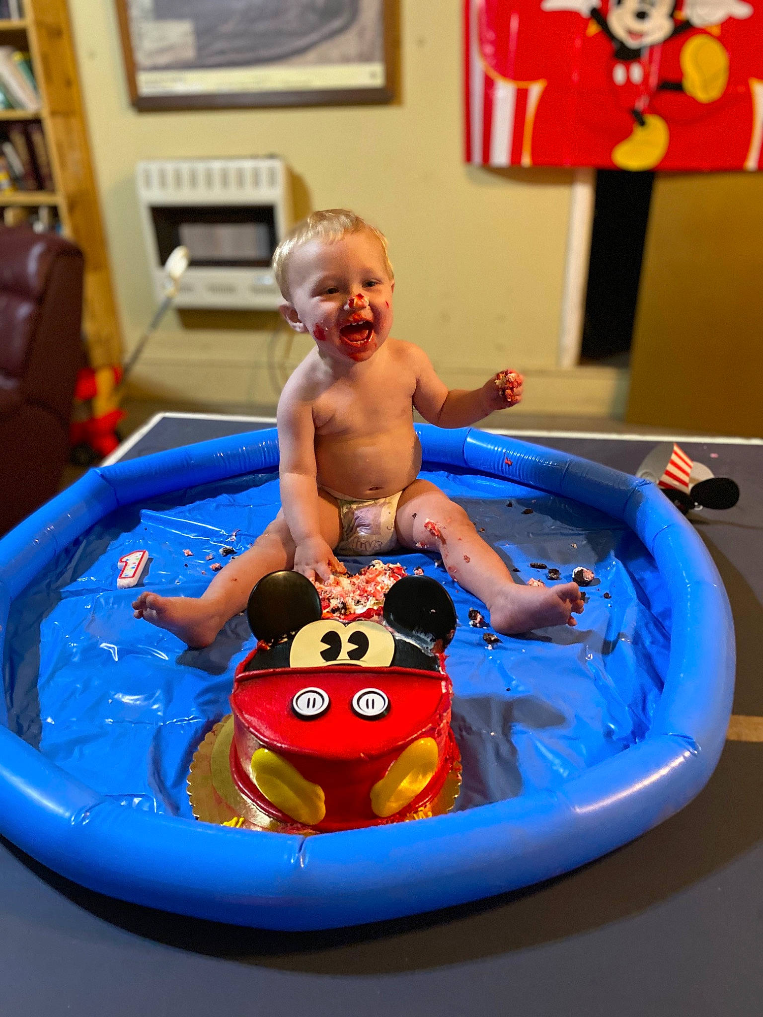 Mykah joined the competition — help win amazing prizes! baby, baby_playing_with_toys, bathing, blue, bookcase, child, fun, head, indoor_games_and_sports, leisure, person, picture_frame, recreation, red, room, smile, television, toddler, toy, water