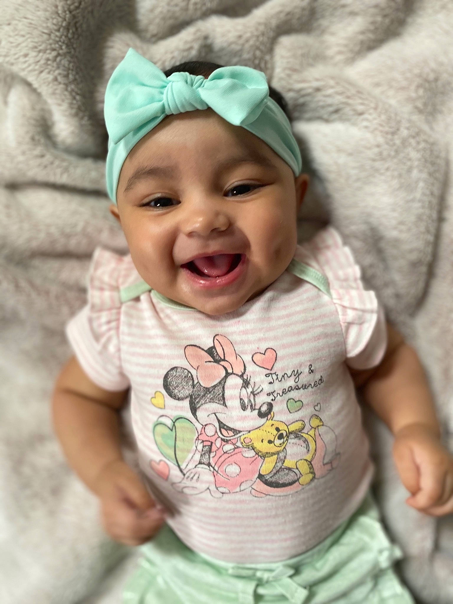 Aleena joined the competition — help win amazing prizes! baby, baby_toddler_clothing, cap, cheek, eye, eyebrow, face, green, happy, head, headgear, headwear, human_body, lip, mouth, outerwear, person, pink, skin, sleeve