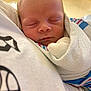 Jordan joined the competition — help win amazing prizes! newborn, baby, sleeping, blanket, wrapped, closeup, face, person, infant, soft, cozy, indoors, human, resting, peaceful, cute, tender, comfort, wrapped_in_blanket, newborn_baby