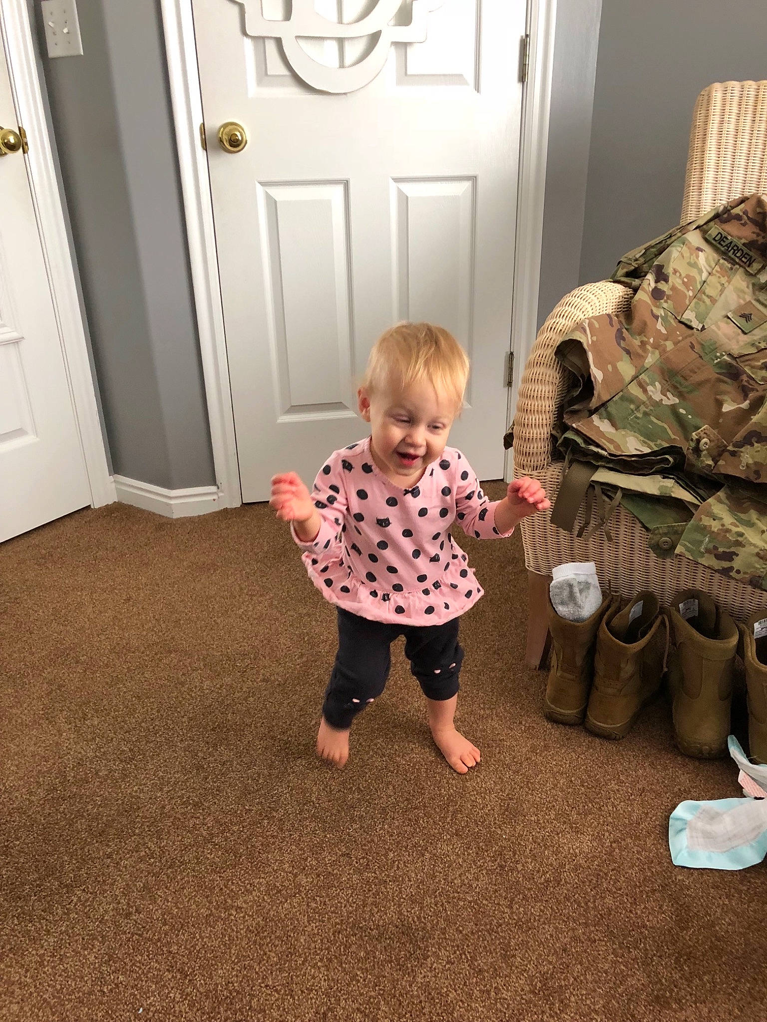 Abi joined the competition — help win amazing prizes! baby, child, design, floor, flooring, home, leg, pattern, person, play, room, shoe, sitting, skin, standing, toddler