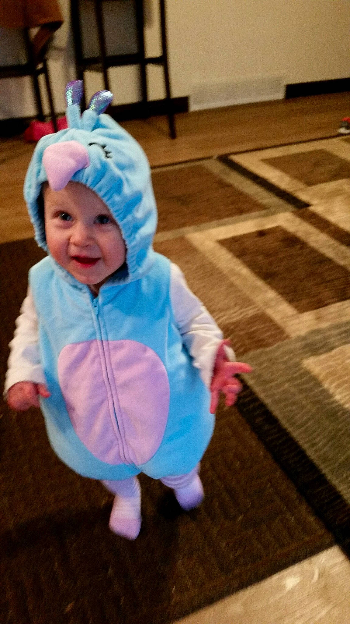 Abi is registered to the contest to win money with this photo: baby, baby_toddler_clothing, child, costume, outerwear, person, pink, play, toddler