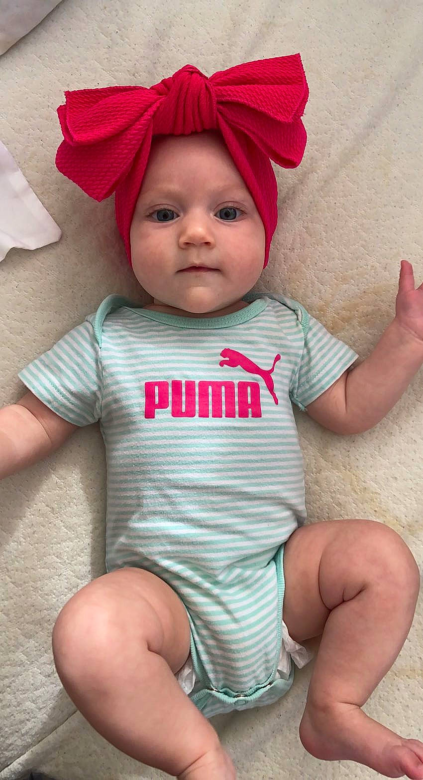 Zaria is registered to the contest to win money with this photo: baby, baby_toddler_clothing, cap, cheek, chin, eye, face, hair, hairstyle, happy, head, headwear, human_body, lip, mouth, outerwear, person, photograph, skin, sleeve