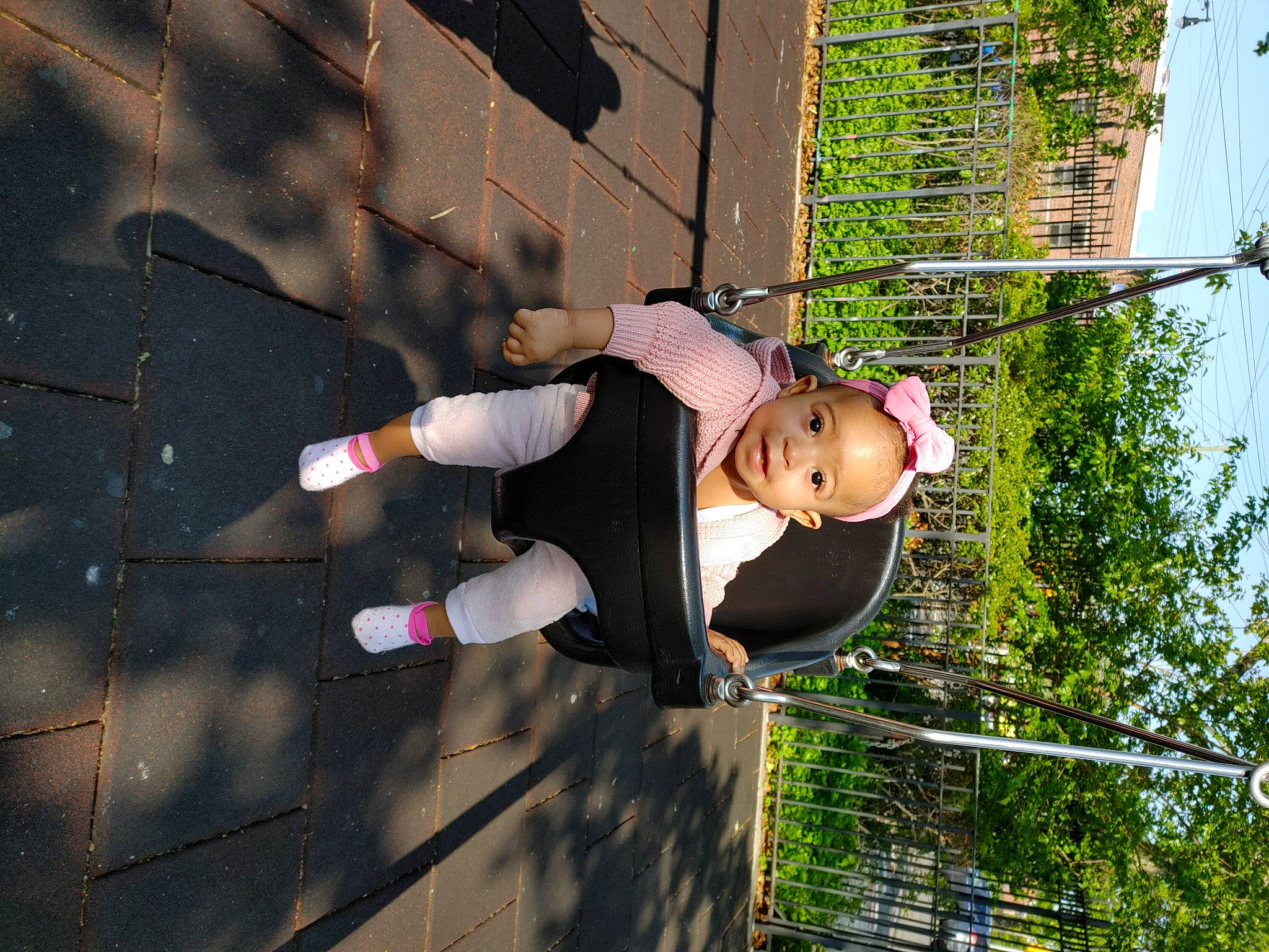 Serenity is registered to the contest to win money with this photo: fun, happy, leisure, person, plant, recreation, road_surface, rope, toddler, tree