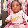 Madinah joined the competition — help win amazing prizes! baby, blanket, car_seat, child, clothing, cute, expression, face, feet, footwear, hand, indoors, infant, knit, nike, pink, portrait, relaxing, sitting, youth