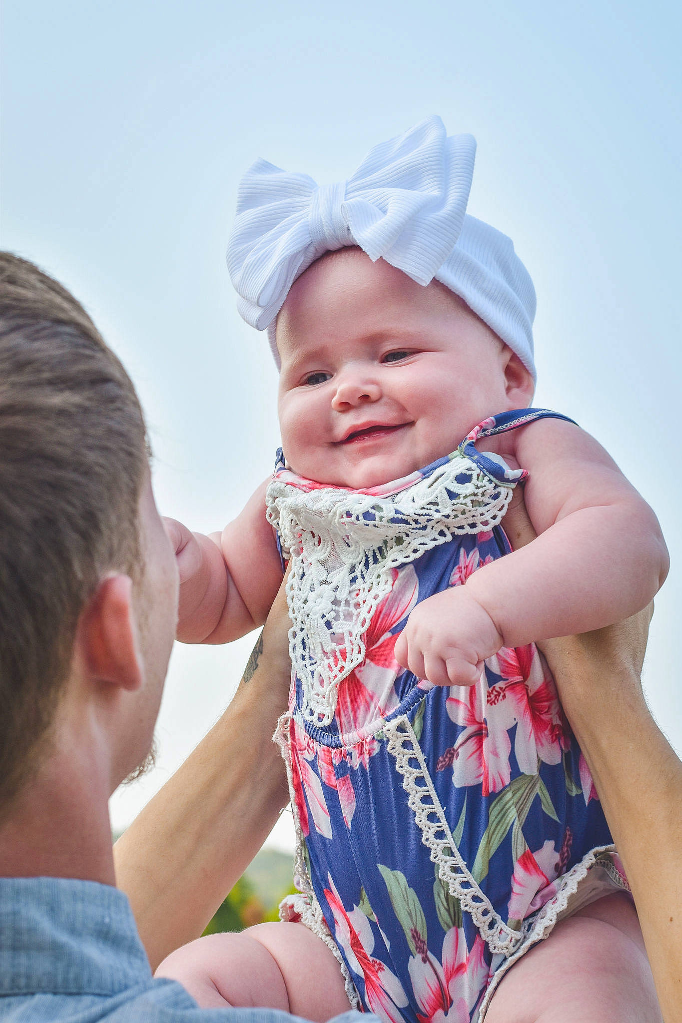 Ashtyn joined the competition — help win amazing prizes! arm, baby, baby_toddler_clothing, cap, dress, eye, facial_expression, finger, gesture, hand, happy, hat, headgear, headwear, interaction, joy, people_in_nature, person, photograph, skin