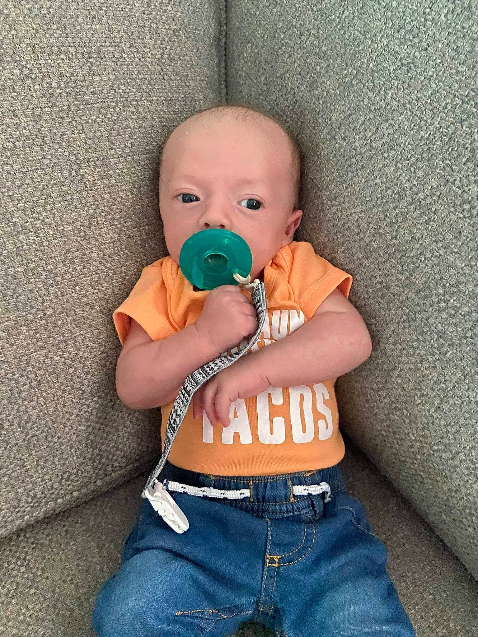 Leeam is registered to the contest to win money with this photo: arm, azure, baby, baby_toddler_clothing, cheek, chin, eye, gesture, hand, head, human_body, iris, joint, mouth, neck, nose, person, shoulder, skin, sleeve