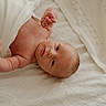 Banx joined the competition — help win amazing prizes! baby, infant, blanket, bed, soft, skin, face, eyes, hand, newborn, lying_down, cute, indoors, sleeping_area, child, portrait, resting, warm_light, gentle, cozy