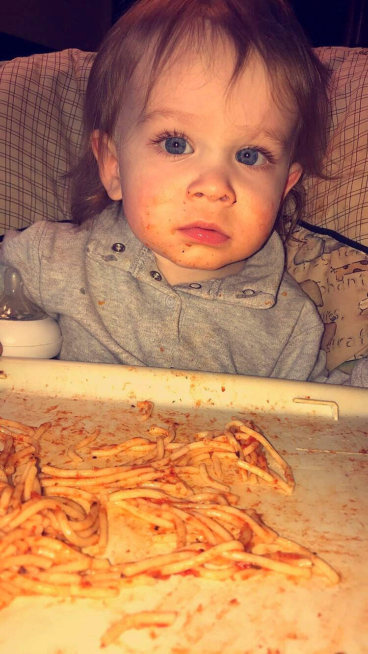 Connor is registered to the contest to win money with this photo: cheek, child, chin, comfort_food, cuisine, dish, eating, eye, face, food, forehead, head, lip, mouth, nose, organ, person, skin, toddler