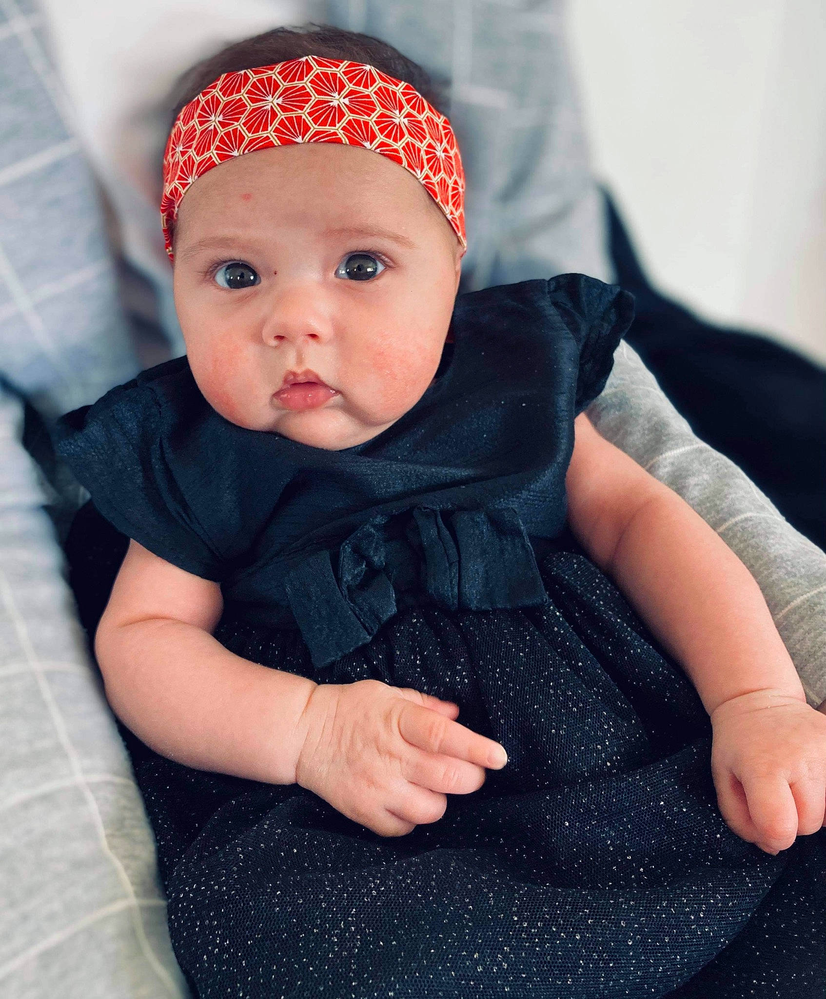 Kataleya participe au concours pour gagner de l'argent avec cette photo : baby, beanie, bonnet, cap, cheek, child, clothing, face, fashion_accessory, finger, hair_accessory, hand, hat, head, headband, headgear, headwear, lip, pattern, person