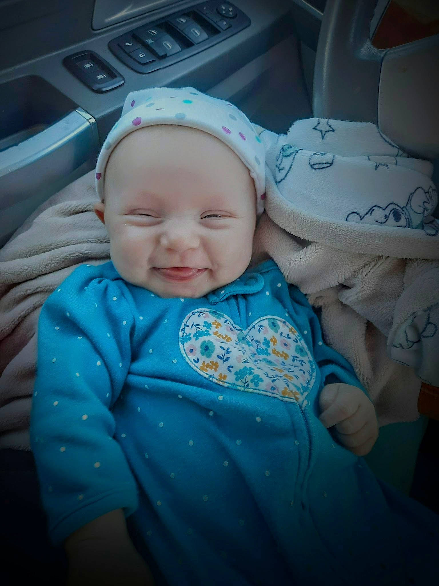 Preslee joined the competition — help win amazing prizes! automotive_design, baby, baby_toddler_clothing, blue, car_seat, cheek, child, comfort, cool, electric_blue, family_car, flash_photography, fun, happy, human, person, personal_luxury_car, skin, smile, toddler