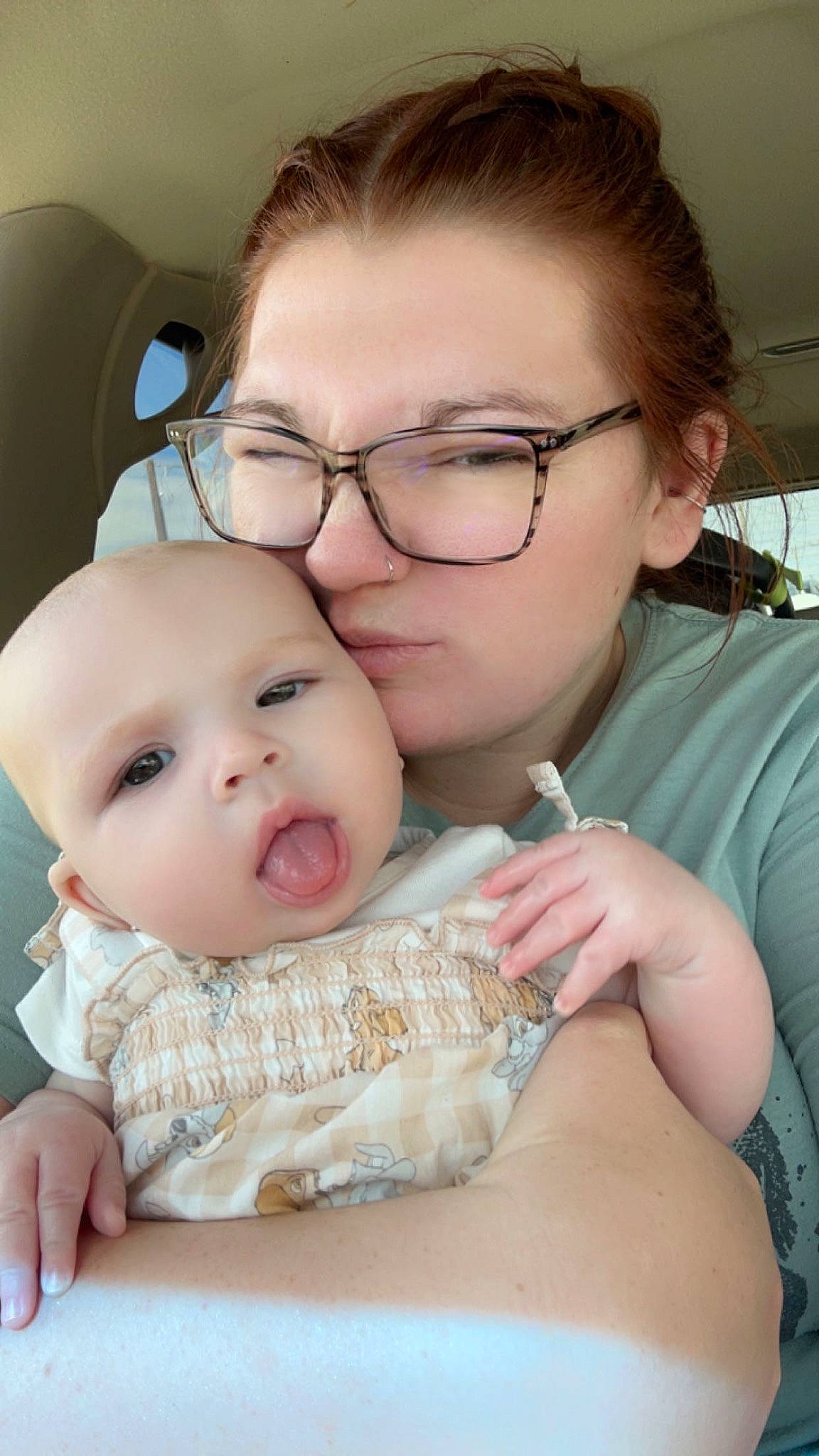 Christina is registered to the contest to win money with this photo: baby, cheek, child, drinkware, ear, eyebrow, eyelash, facial_expression, gesture, glasses, hair, hairstyle, happy, iris, lip, mouth, nose, person, skin, toddler
