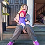 Kaliyah joined the competition — help win amazing prizes! baby, child, person, sitting, steps, door, plant, bandana, purple_clothing, smiling, happy, home, interior, footwear, sneakers, casual_clothing, wood, porch, family, outdoor