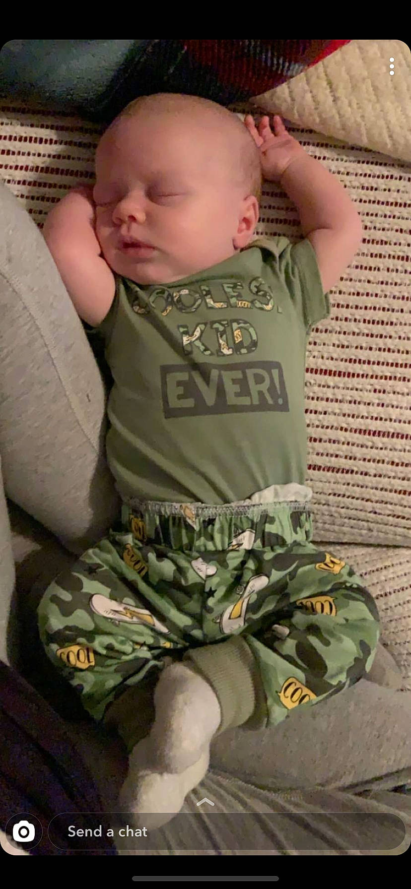 Zayne is registered to the contest to win money with this photo: arm, baby, baby_products, baby_toddler_clothing, camouflage, child, design, military_camouflage, pattern, person, sleep, sleeve, soldier, toddler