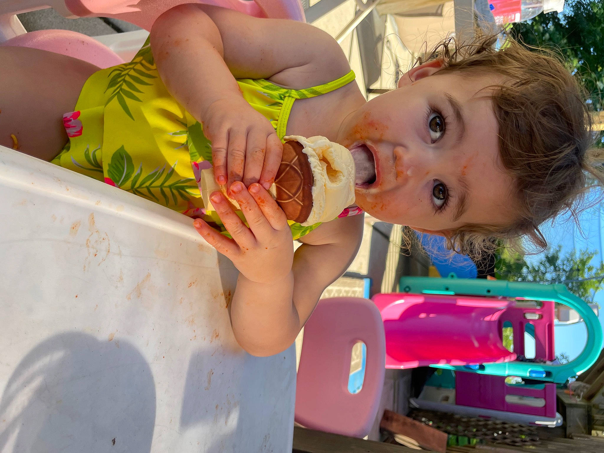 Sawyer is registered to the contest to win money with this photo: arm, baby, child, food, food_craving, fun, green, hairstyle, happy, leisure, person, plant, play, recreation, summer, tire, toddler, toy_vehicle, tree, water