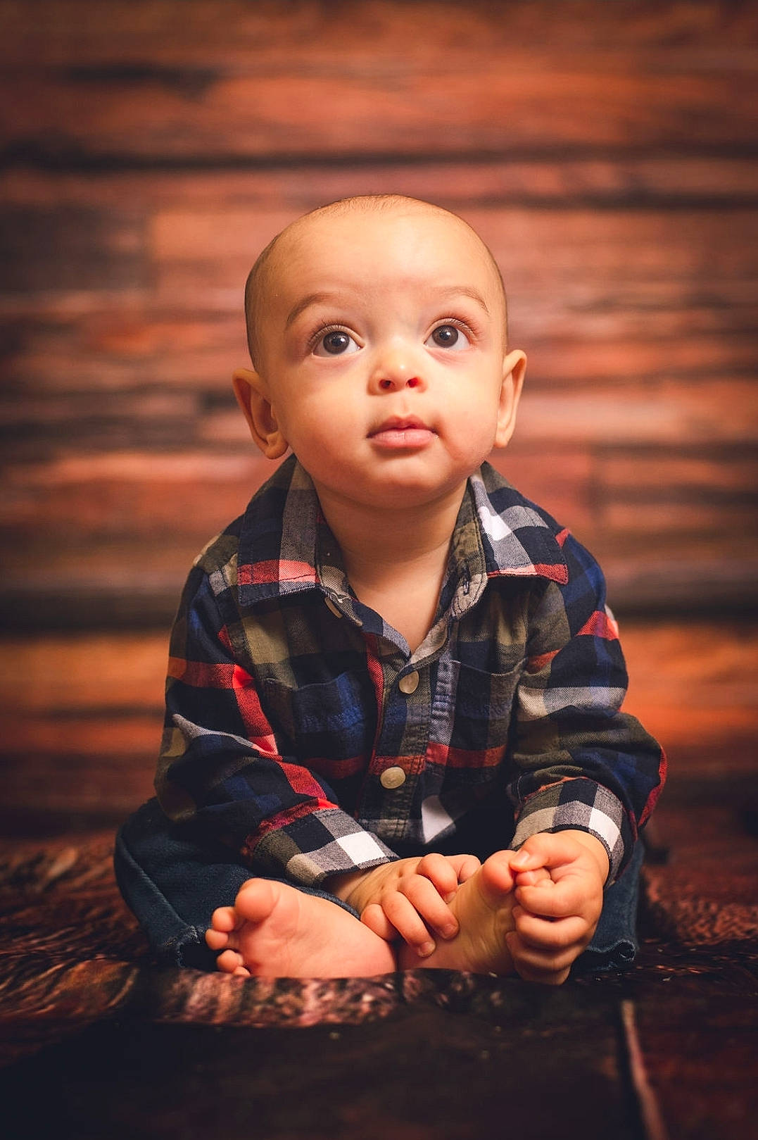 Dominic is registered to the contest to win money with this photo: arm, baby, baby_toddler_clothing, cheek, child, darkness, eye, face, flash_photography, flooring, fun, gesture, hand, happy, head, person, plaid, skin, sleeve, toddler