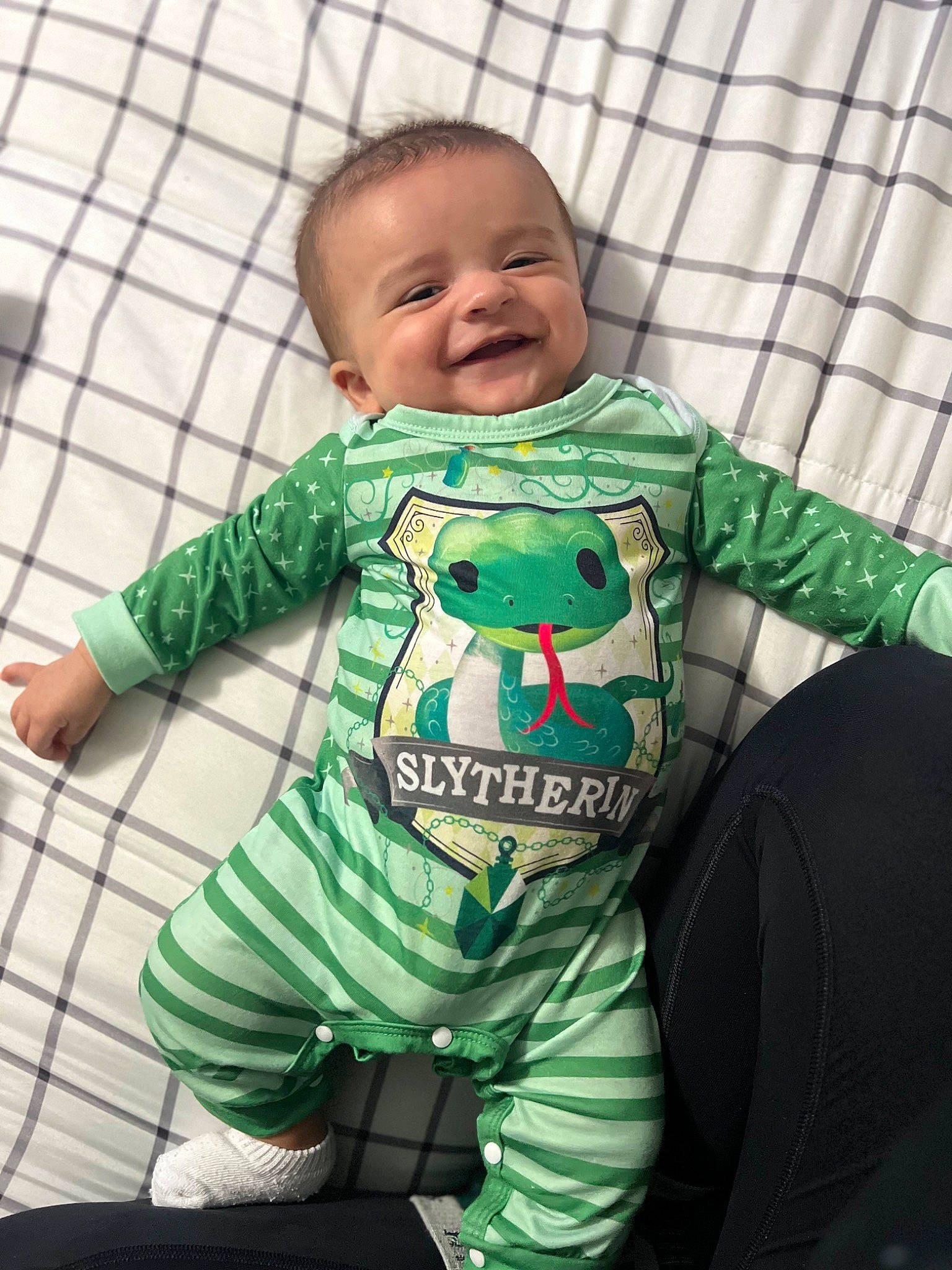 Ares joined the competition — help win amazing prizes! baby, baby_products, baby_safety, baby_toddler_clothing, child, comfort, face, green, happy, head, joy, linens, long_sleeved_t_shirt, outerwear, pattern, person, sitting, sleeve, smile, t_shirt