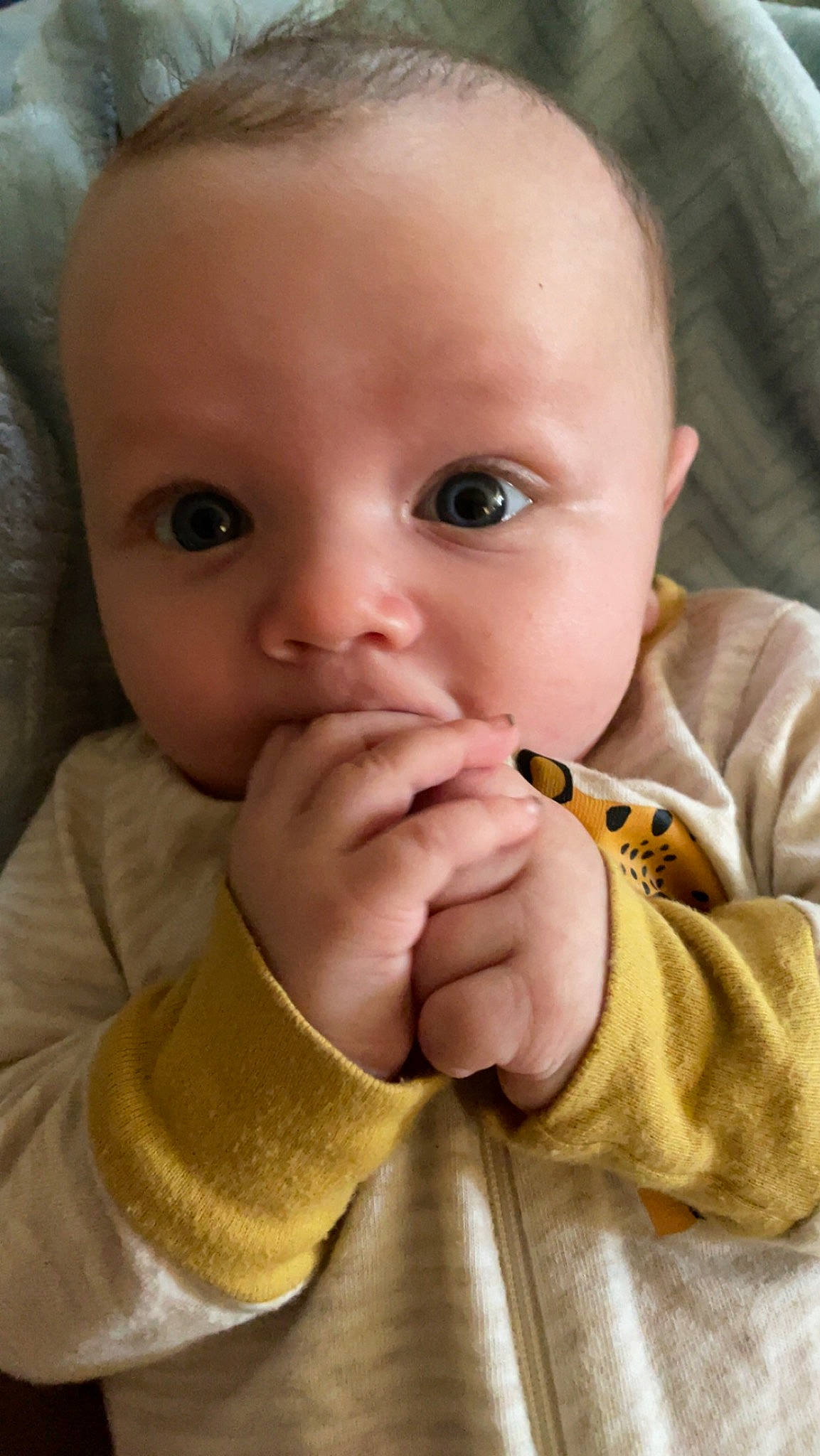 Jeremy is registered to the contest to win money with this photo: baby, baby_toddler_clothing, cheek, child, close_up, collar, ear, eyelash, finger, gesture, iris, lip, mammal, mouth, nail, nose, person, skin, sleeve, thumb