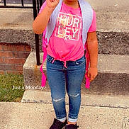 Kennedi joined the competition — help win amazing prizes! child, girl, peace_sign, pink_shirt, jeans, backpack, concrete, sidewalk, brick_wall, steps, shoes, casual, outdoor, young, portrait, standing, urban, daytime, smile, fashion