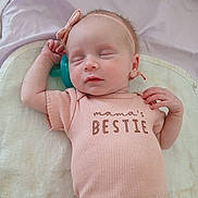 Melody is registered to the contest to win money with this photo: baby, sleeping, infant, pink_outfit, headband, pacifier, blanket, soft_texture, cute, child, peaceful, resting, indoor, closeup, portrait, newborn, toddler, baby_clothes, adorable, relaxing
