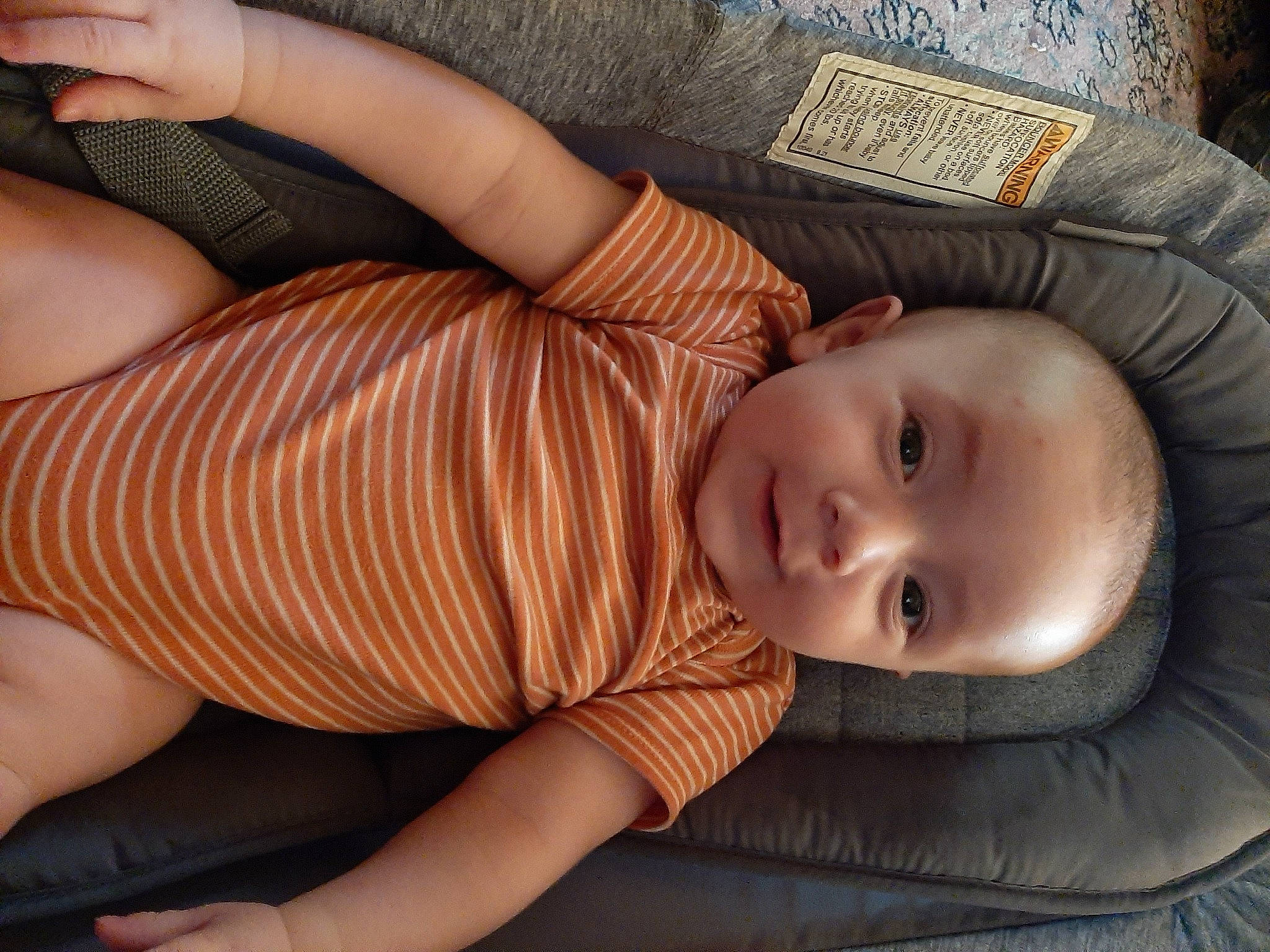 Greysin is registered to the contest to win money with this photo: baby, baby_toddler_clothing, cheek, child, comfort, elbow, eye, head, human_body, human_leg, lip, mouth, nose, pattern, person, skin, sleeve, thigh, toddler, tree