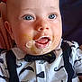 baby, child, blue_eyes, messy_face, food, bow_tie, suspenders, mustache_pattern, clothing, portrait, close_up, infant, cute, expression, person, smiling, indoors, fabric_background, black_and_white, young