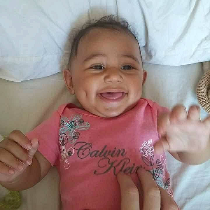 Aaliyah joined the competition — help win amazing prizes! arm, baby, cheek, child, eye, face, facial_expression, finger, forehead, hand, happy, head, lip, mouth, nose, person, pink, skin, smile, thumb