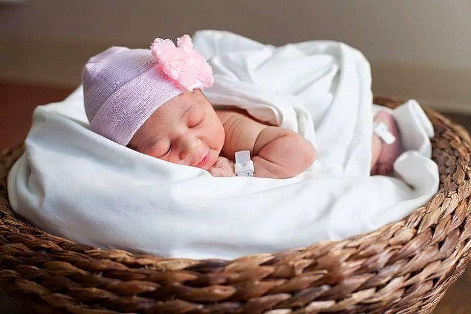 Aaliyah is registered to the contest to win money with this photo: baby, baby_products, baby_sleeping, basket, birth, child, comfort, infant_bed, person, pink, product, sleep, toddler