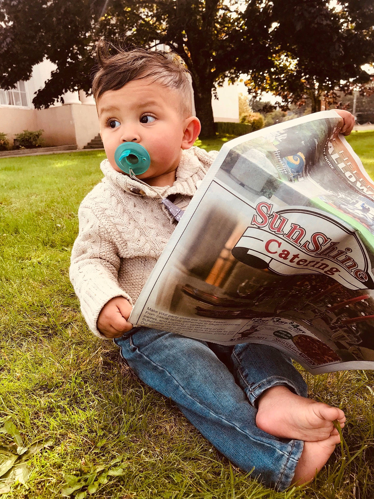 Davian is registered to the contest to win money with this photo: baby, child, grass, lawn, leaf, male, person, play, sitting, surprise, toddler