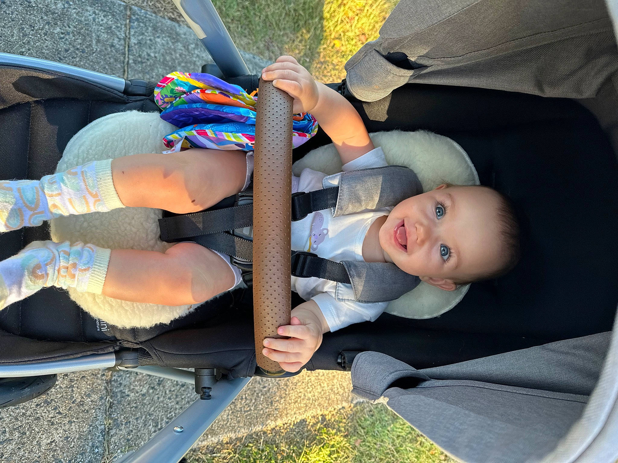 Patience joined the competition — help win amazing prizes! auto_part, baby, baby_carriage, baby_products, child, comfort, fun, grass, hand, human_leg, knee, people, person, plant, smile, sneakers, thigh, toddler, tree, vehicle_door