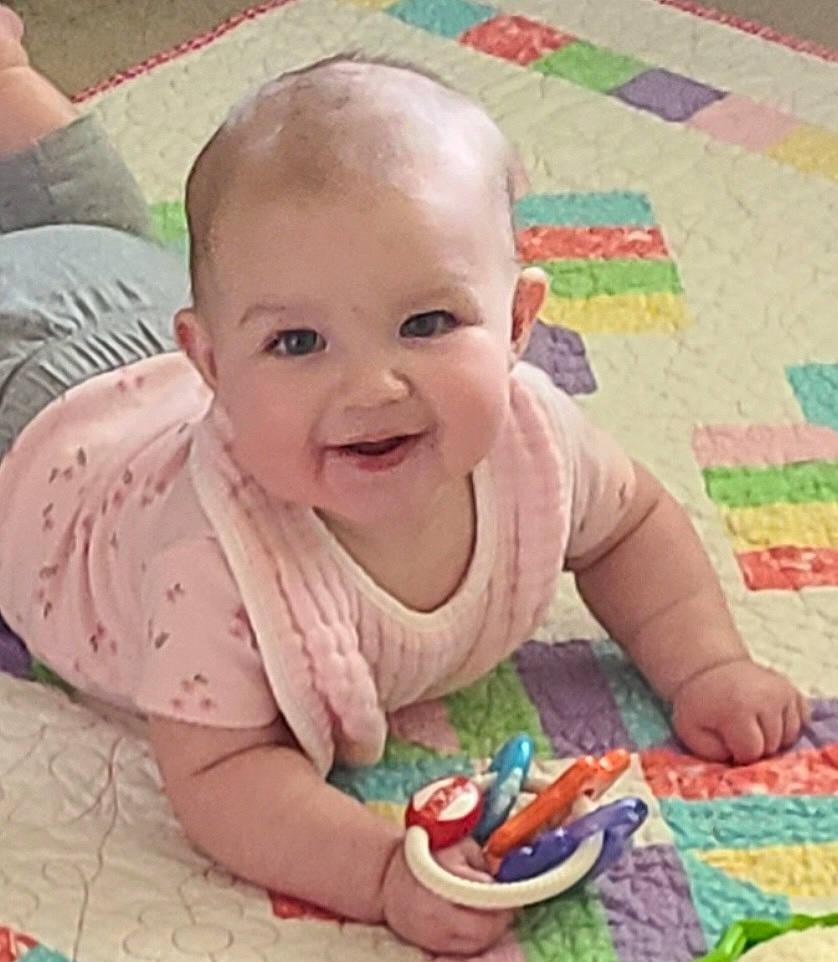 Danielle joined the competition — help win amazing prizes! baby, baby_toddler_clothing, cheek, chin, eye, facial_expression, finger, flooring, happy, head, iris, joy, mouth, nose, person, pink, product, skin, smile, textile