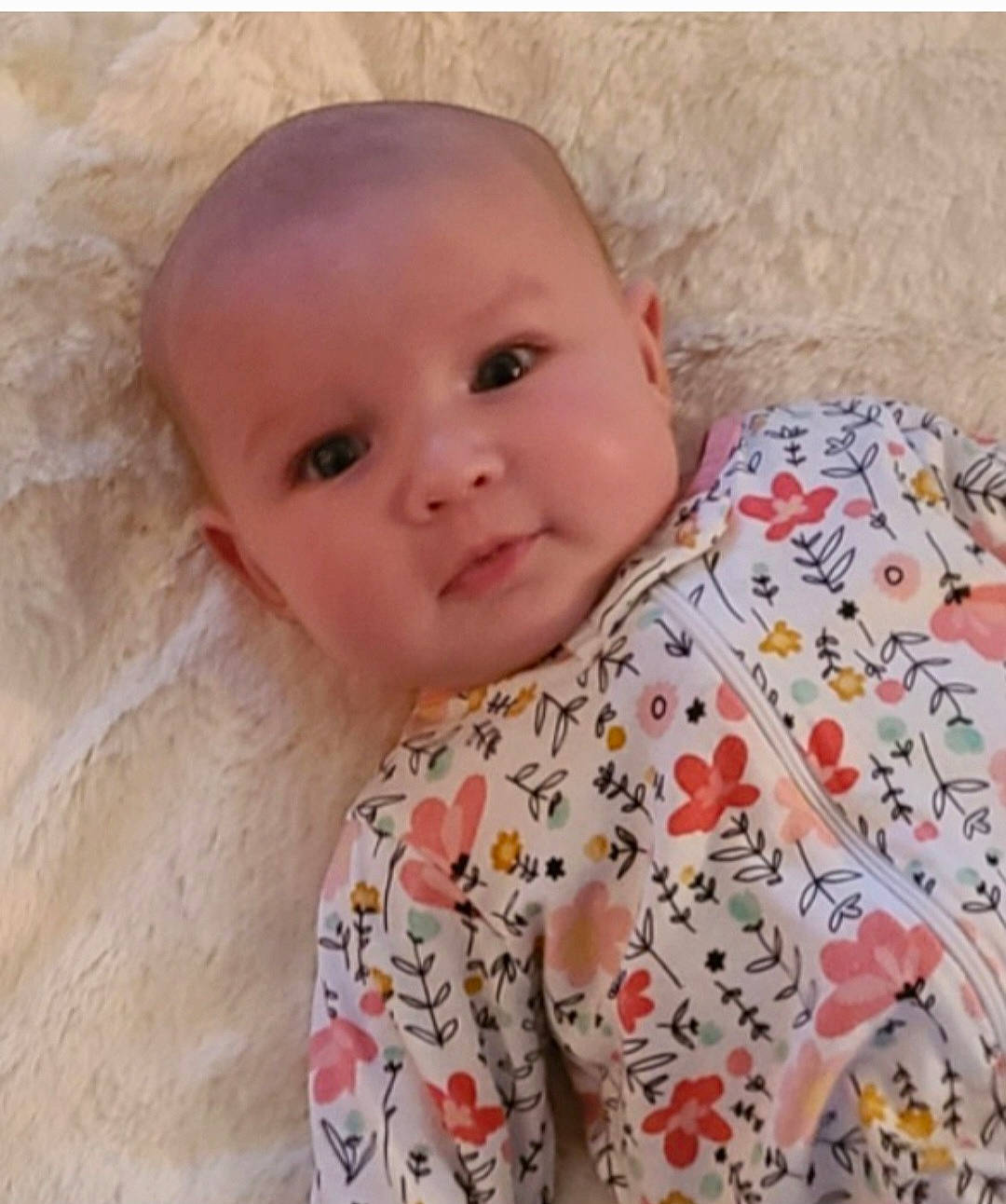 Danielle is registered to the contest to win money with this photo: baby, baby_toddler_clothing, bedding, cheek, child, comfort, face, happy, human_body, iris, linens, lip, nose, pattern, person, room, skin, sleeve, smile, t_shirt