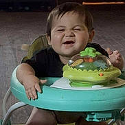 Jackson Tank joined the competition — help win amazing prizes! baby, walker, toy, indoor, floor, child, funny_face, candid, cute, smiling, chubby, legs, hands, black_shirt, play, infant, expression, person, home, young