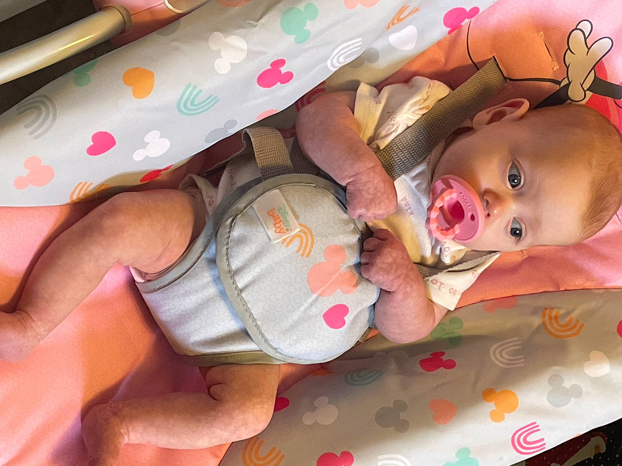 Olivia is registered to the contest to win money with this photo: baby, baby_products, cheek, chest, child, drinkware, eyelash, finger, hand, human_body, human_leg, linens, mouth, nail, person, pink, skin, textile, thigh, toddler