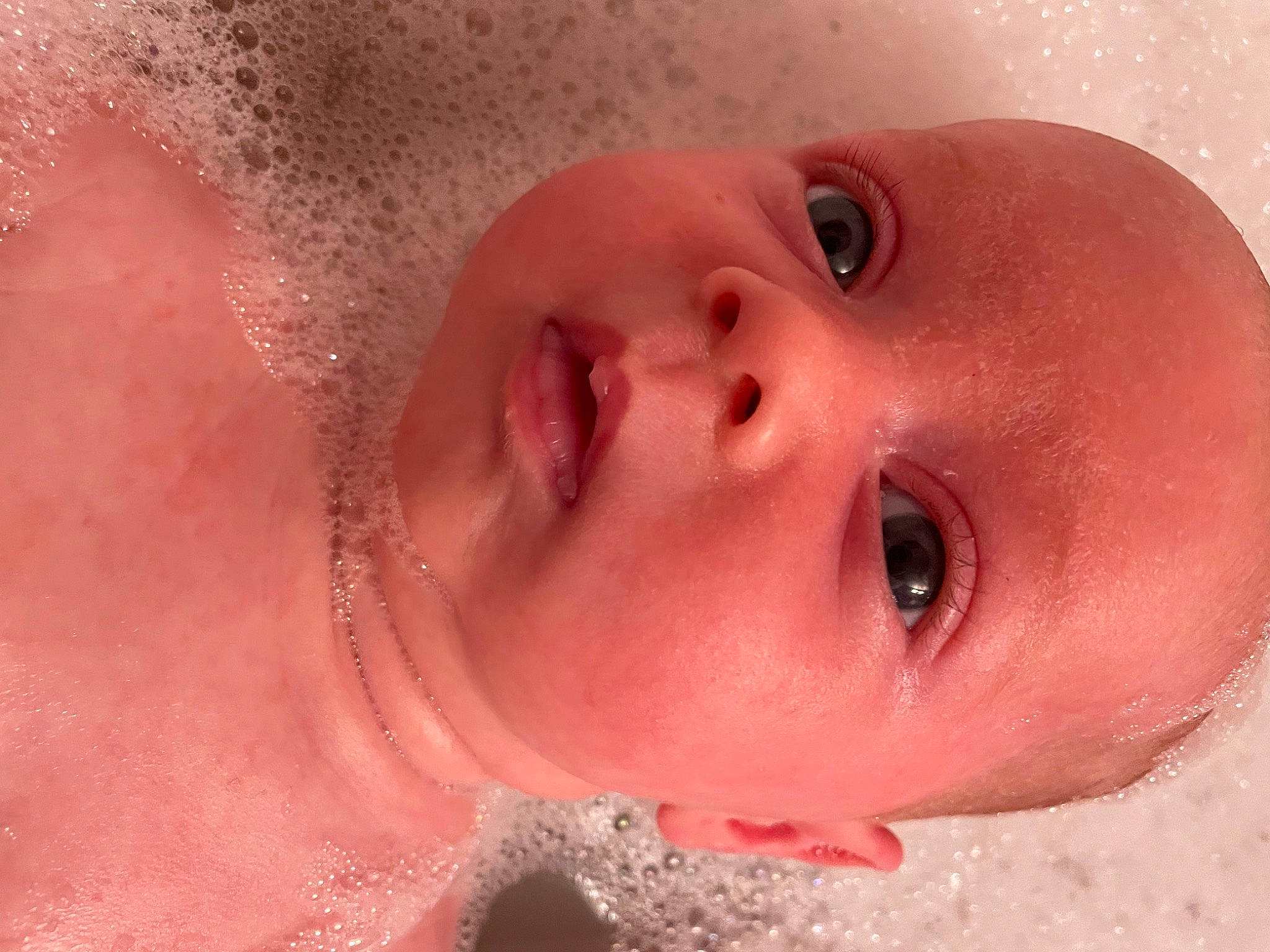 Olivia joined the competition — help win amazing prizes! baby, bathing, cheek, chin, ear, eye, eyebrow, eyelash, face, facial_expression, fluid, headgear, iris, lip, mouth, neck, nose, person, skin, toddler