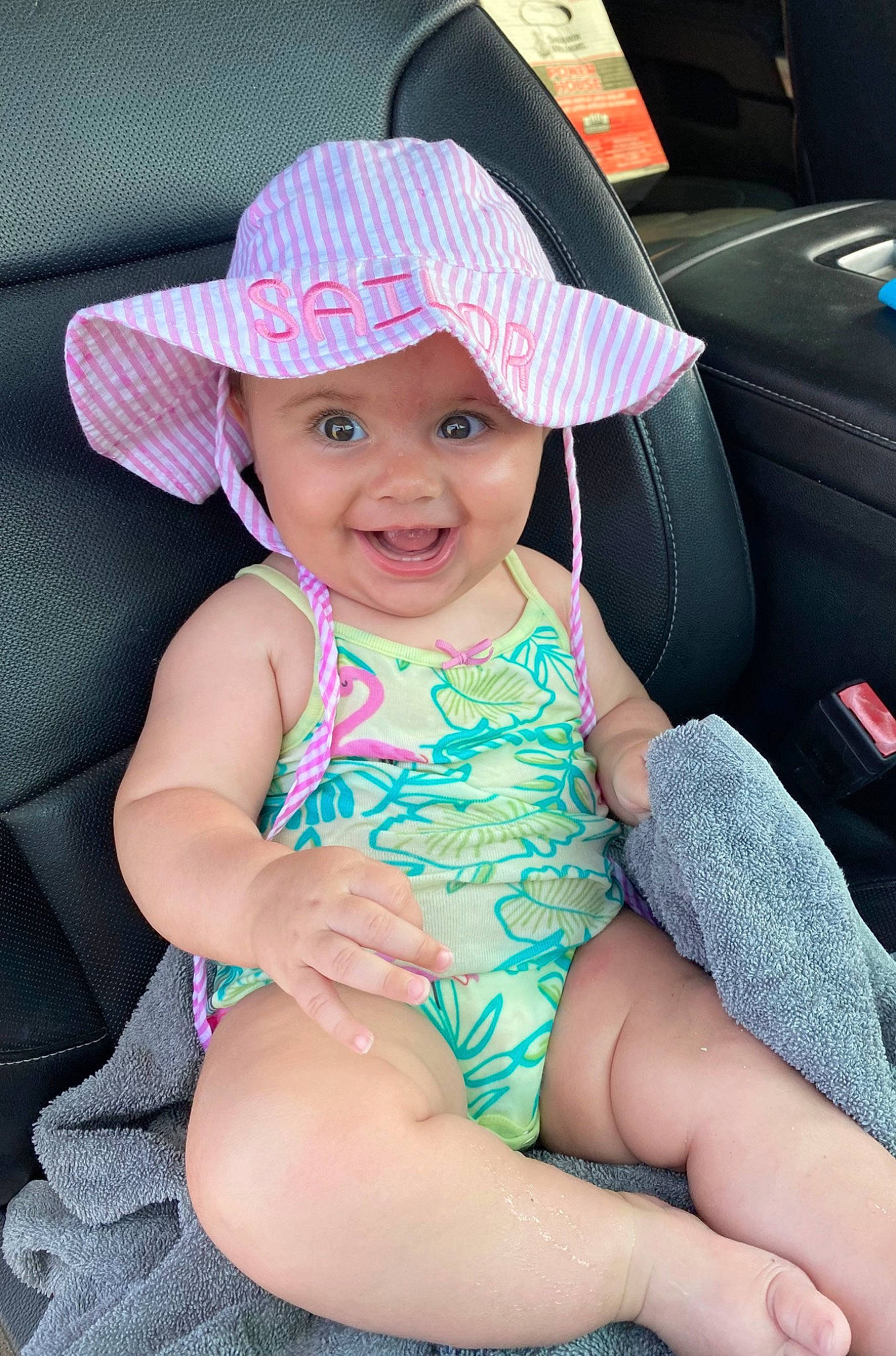 Sailor joined the competition — help win amazing prizes! baby, baby_toddler_clothing, cap, car_seat, child, comfort, face, happy, hat, headgear, headwear, joy, leg, person, pink, product, skin, smile, steering_wheel, sun_hat
