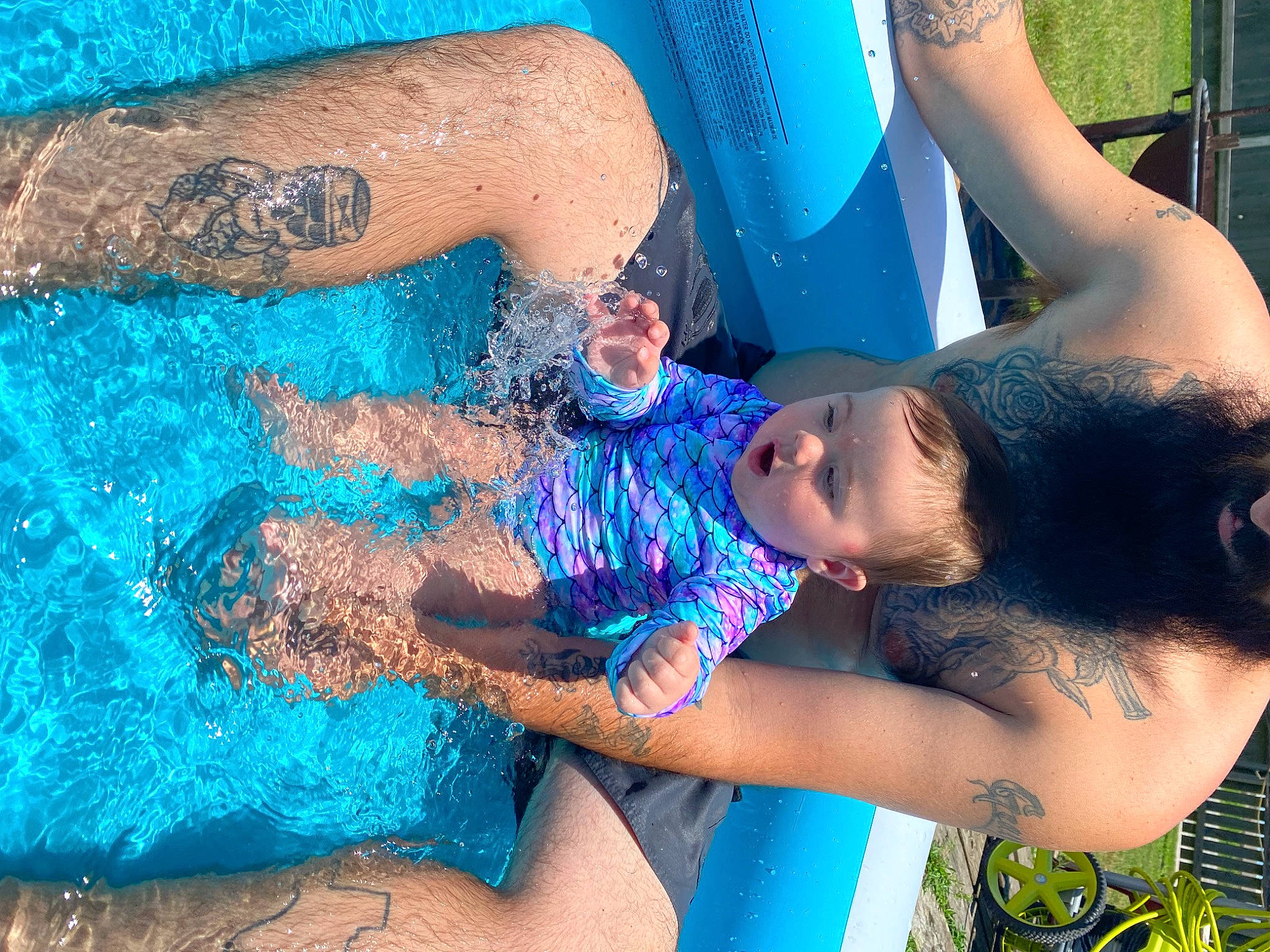 Sailor is registered to the contest to win money with this photo: aqua, arm, azure, black_hair, blue, elbow, fun, green, happy, human_body, joint, leisure, muscle, person, photograph, recreation, summer, swimwear, thigh, water