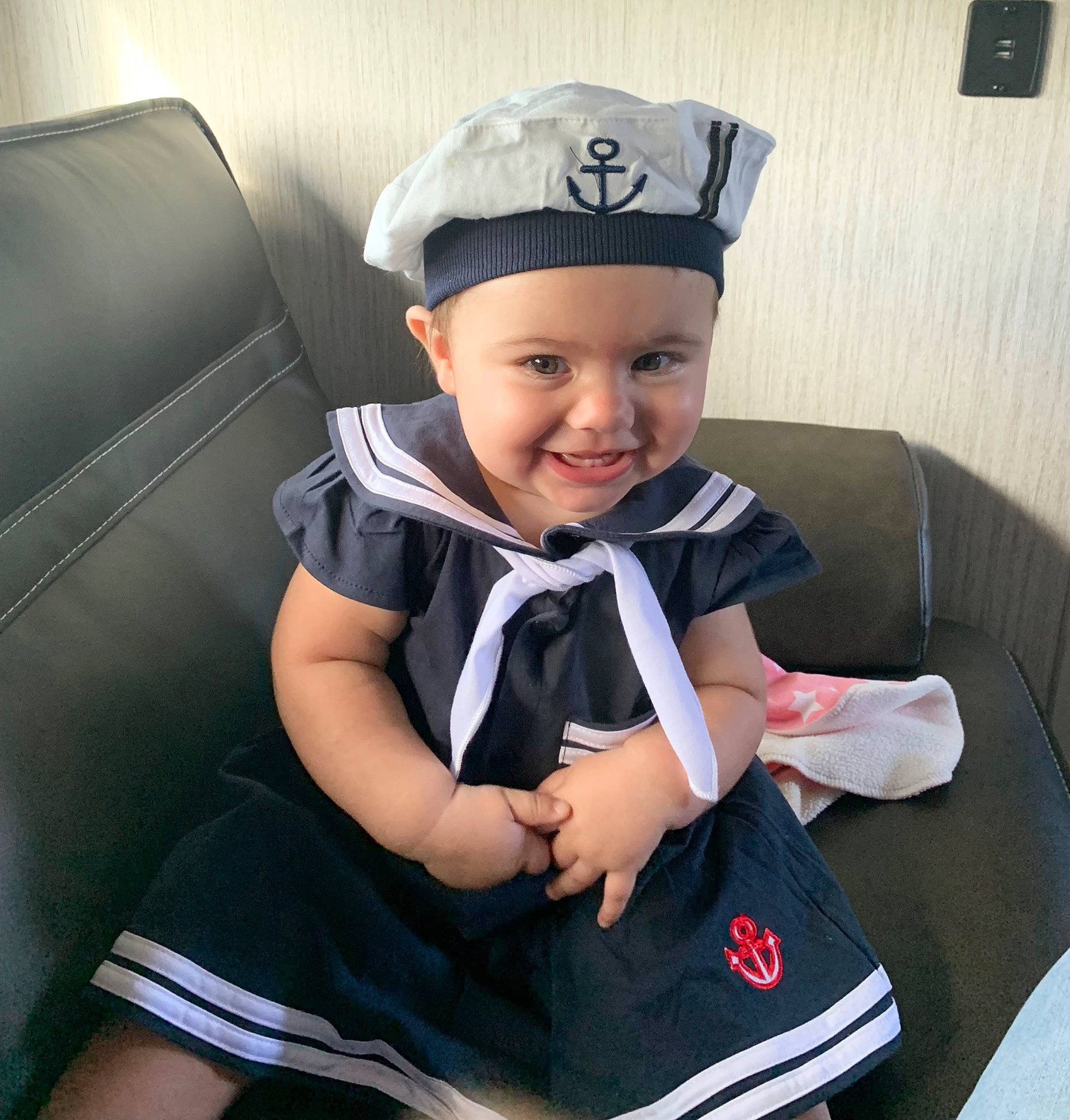 Sailor joined the competition — help win amazing prizes! auto_part, baby, baby_toddler_clothing, cap, car_seat, car_seat_cover, child, costume_hat, electric_blue, face, fashion_accessory, happy, hat, headwear, joy, person, sitting, sleeve, smile, tie