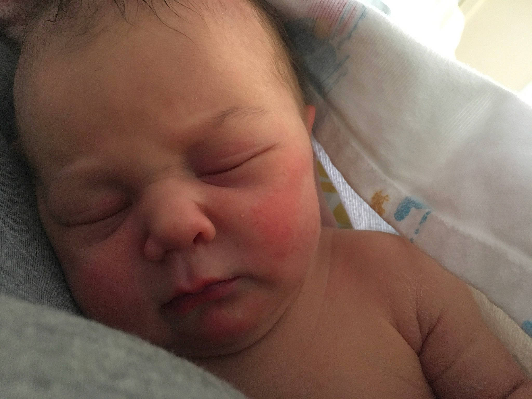 Ezmae is registered to the contest to win money with this photo: baby, bedtime, cheek, child, chin, close_up, ear, eye, eyebrow, face, finger, forehead, hand, head, lip, mouth, nap, nose, person, skin