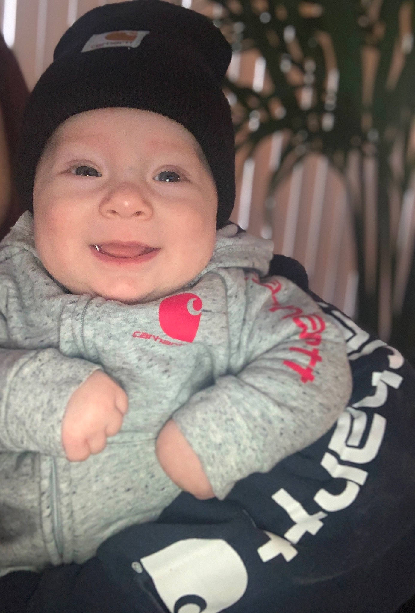 Cohen joined the competition — help win amazing prizes! baby, baby_laughing, baby_toddler_clothing, cap, cheek, child, comfort, eye, flash_photography, fun, gesture, happy, headwear, iris, organ, person, sitting, skin, sleeve, smile