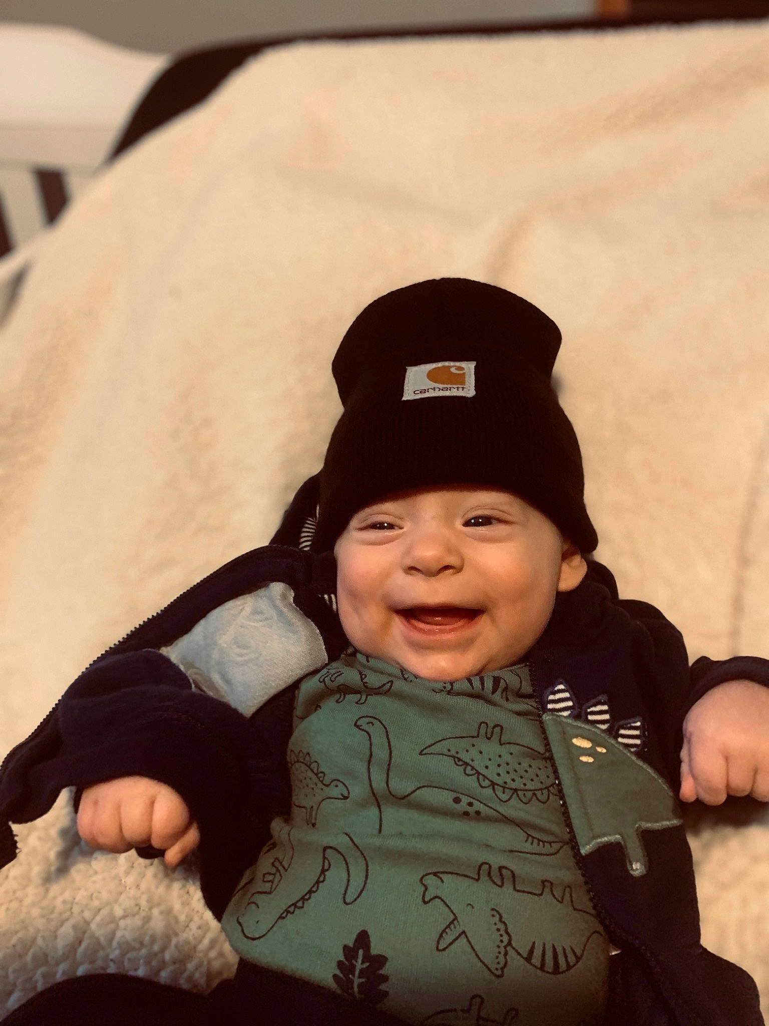 Cohen joined the competition — help win amazing prizes! arm, baby, baby_products, baby_toddler_clothing, cap, cheek, child, comfort, cool, face, gesture, happy, head, headgear, headwear, person, sitting, skin, sleeve, smile