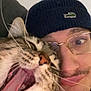 accessories, adult, animal, baseballcap, beanie, bodypart, cap, cat, clothing, face, glasses, hat, head, male, man, mouth, person, pet, photography, portrait