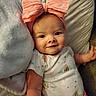 Sophia joined the competition — help win amazing prizes! baby, infant, smile, pink_bow, headband, blanket, quilted, towel, cute, child, lying_down, face, soft_texture, clothing, adorable, happy, portrait, indoors, person, skin