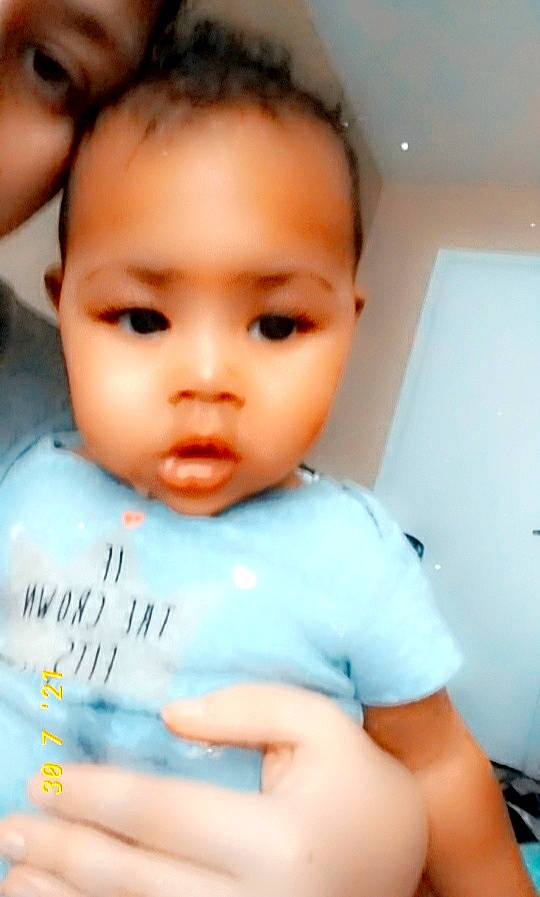 Terra is registered to the contest to win money with this photo: baby, cheek, child, chin, eyelash, finger, flash_photography, fun, gesture, handwriting, happy, iris, lip, nail, nose, person, portrait_photography, skin, thumb, toddler