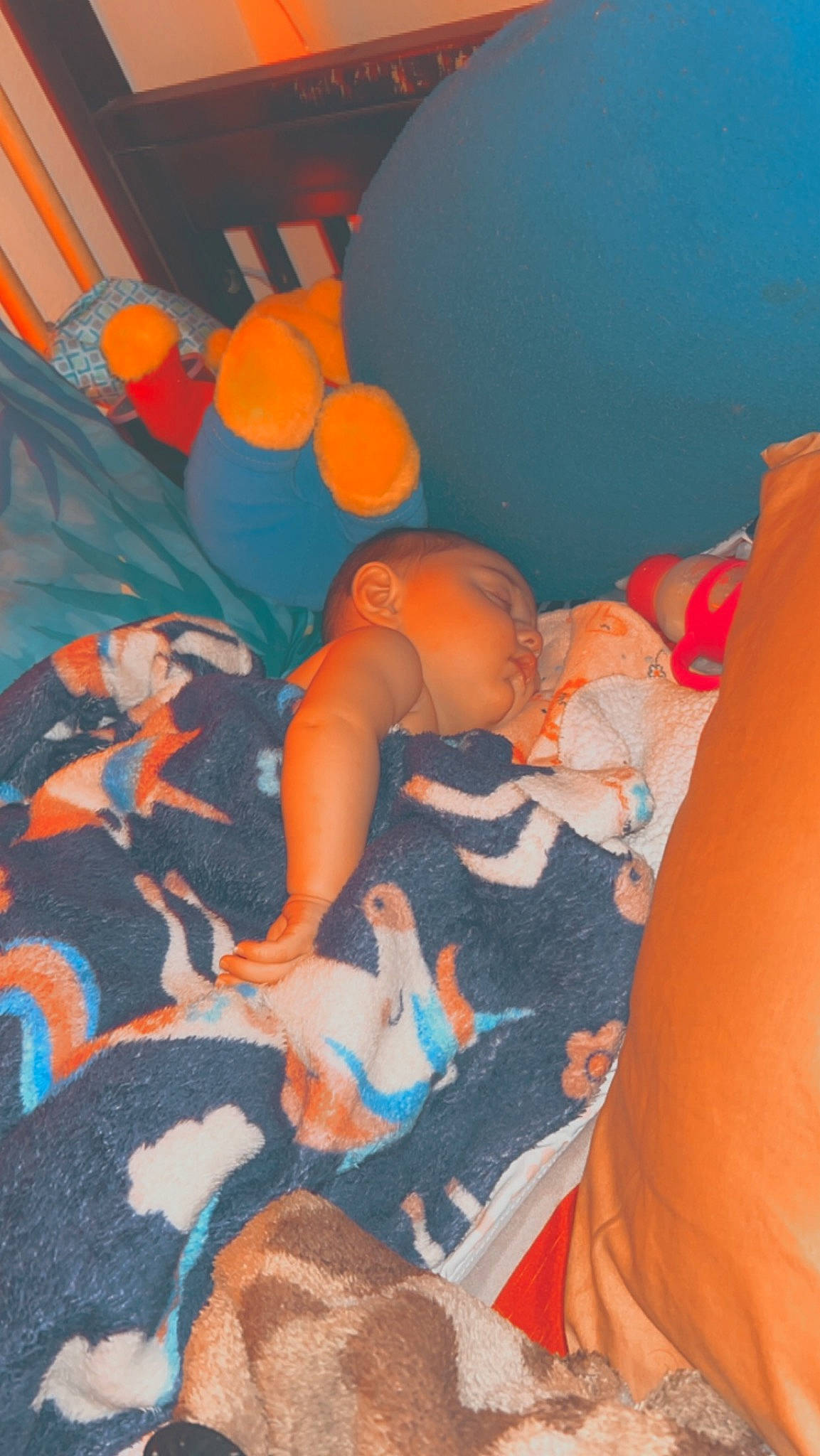 Paisley joined the competition — help win amazing prizes! azure, baby, baby_products, baby_toys, bed, bedding, bedtime, child, comfort, electric_blue, human_leg, linens, nap, orange, pattern, person, room, stuffed_toy, textile, toddler