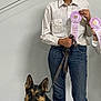 Eva joined the competition — help win amazing prizes! woman, dog, german_shepherd, ribbon, award, leash, jeans, shirt, smile, indoor, concrete_floor, white_wall, casual_clothing, standing, sitting, pet, animal, happy, portrait, competition